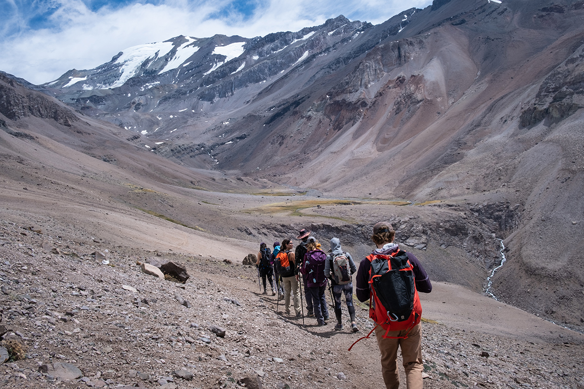 Group of hikers descending from Cerro El Plomo, Chile
