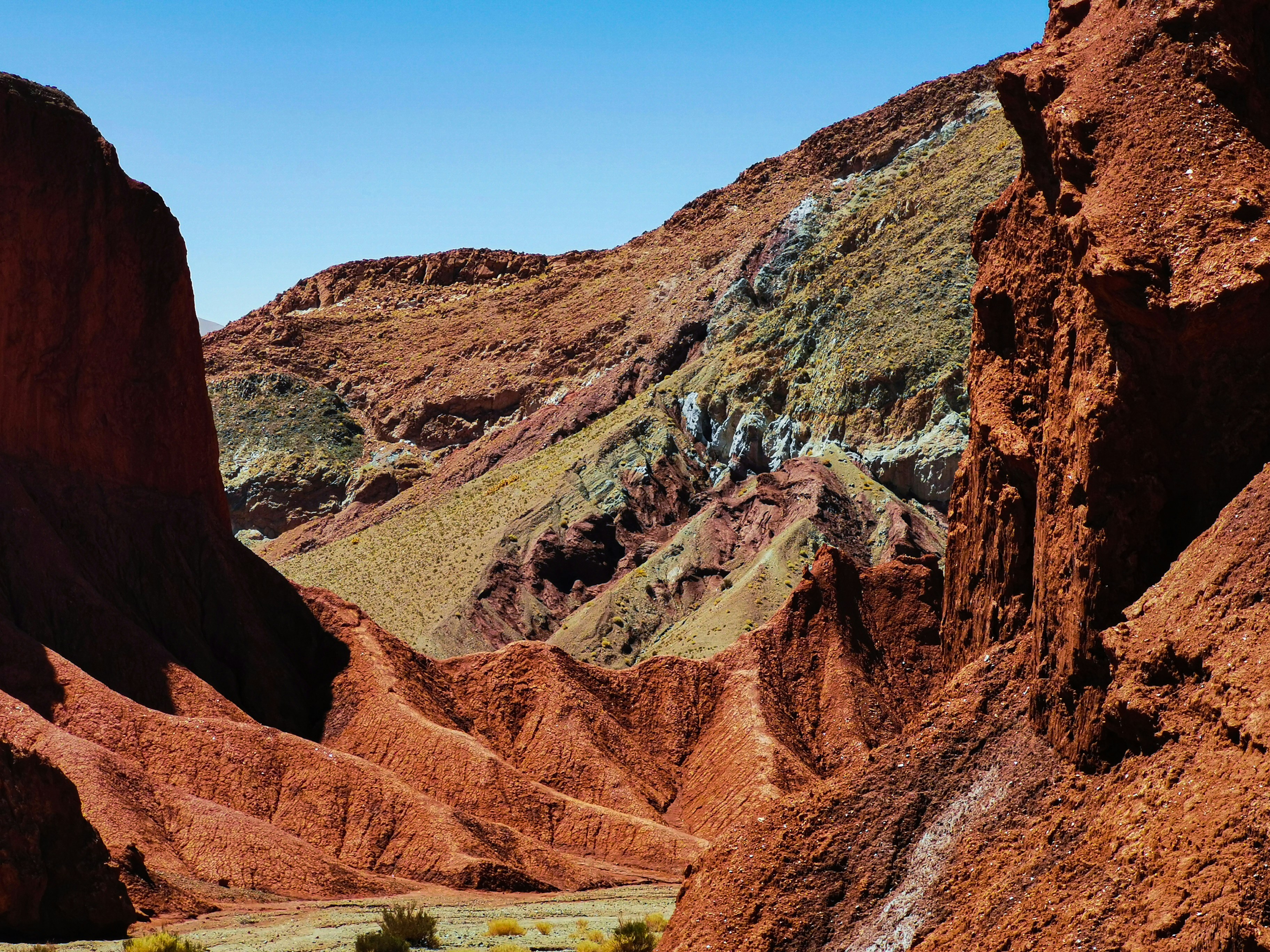Reliefs and multicolored rock formations in the Rainbow Valley, Atacama Desert, Chile