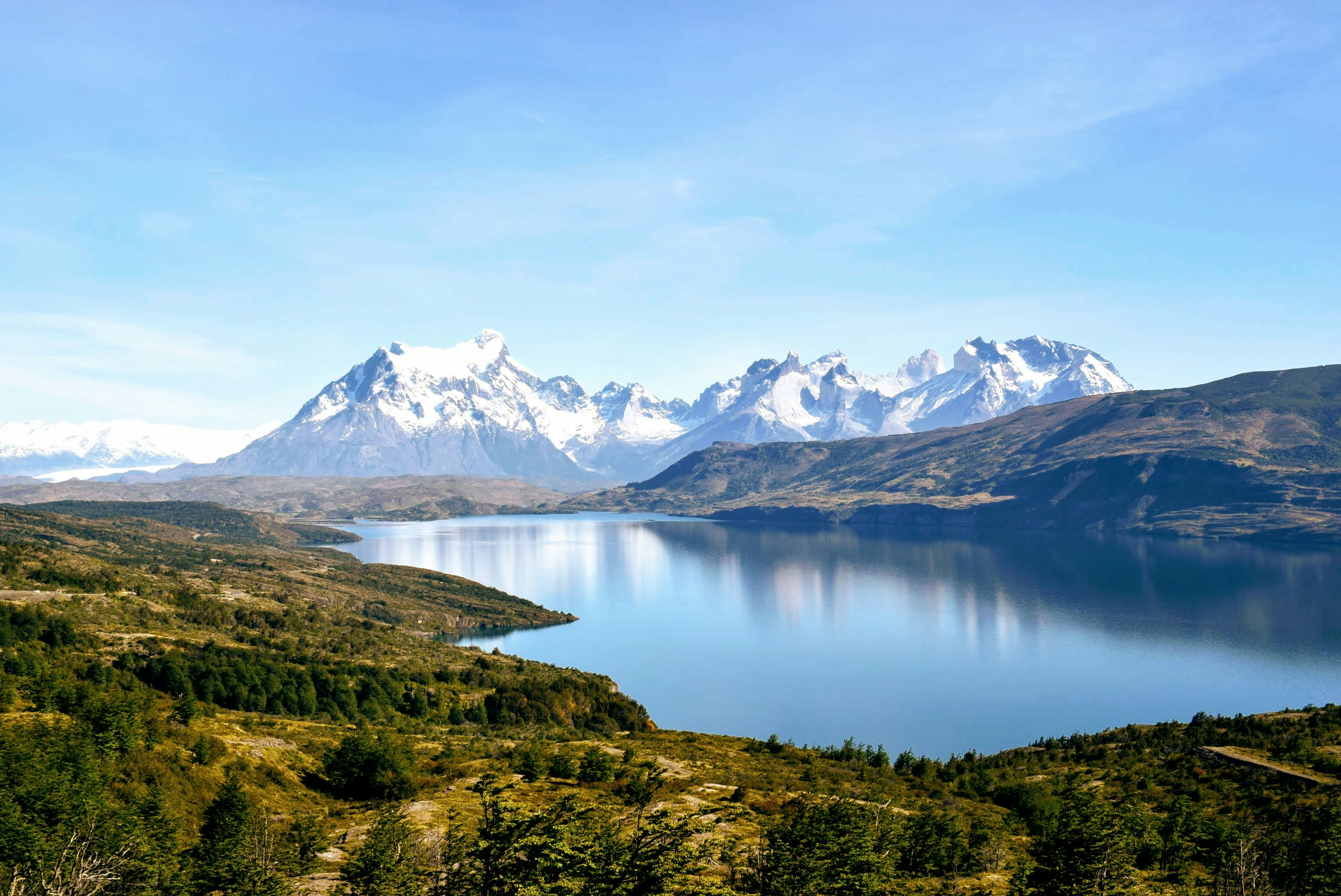 Panoramic view of Lake Nordenskjöld with the Cuernos del Paine and snow-capped mountains in Torres del Paine National Park, Chilean Patagonia.